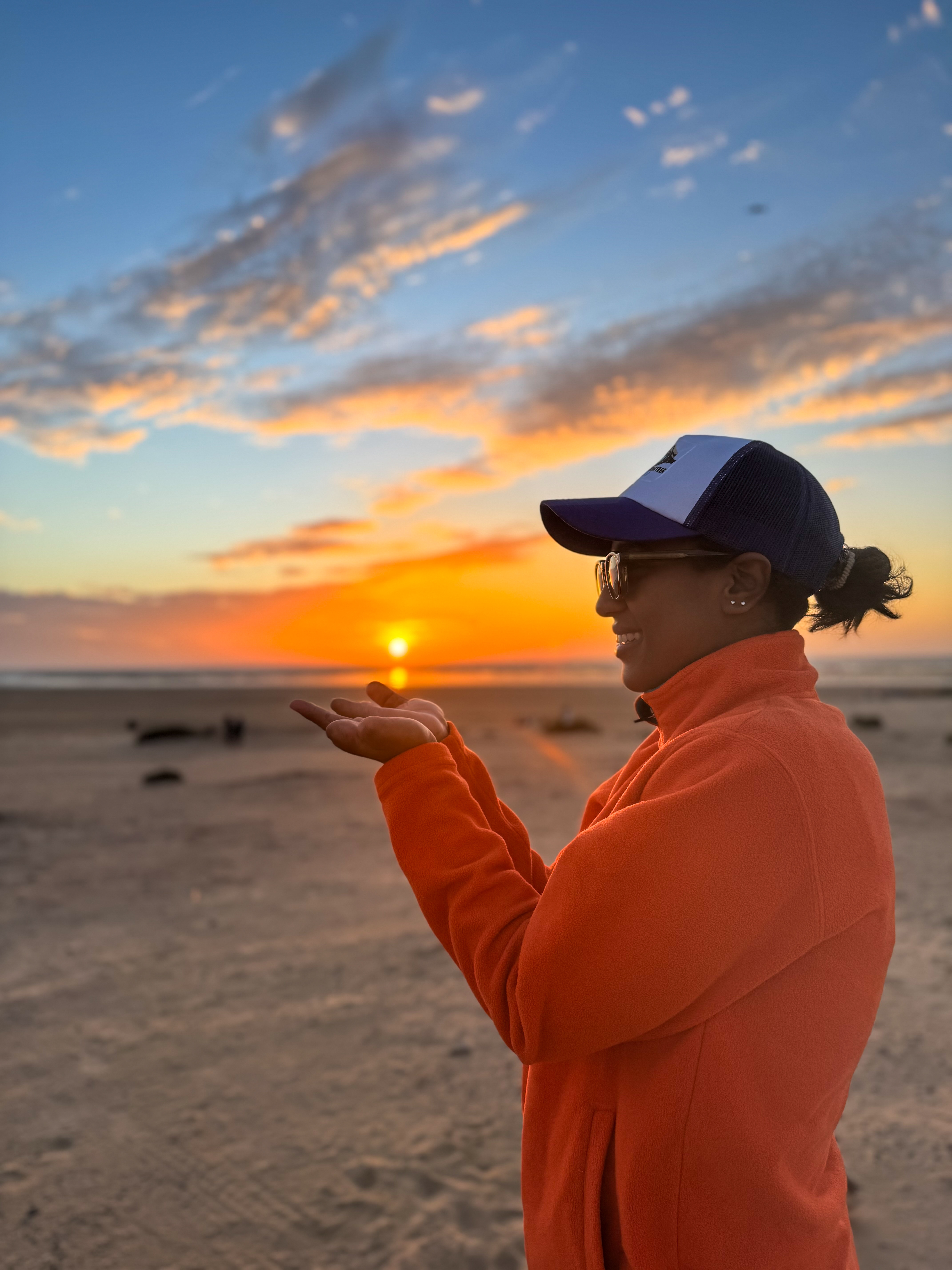 Zineb at the beach during sunset